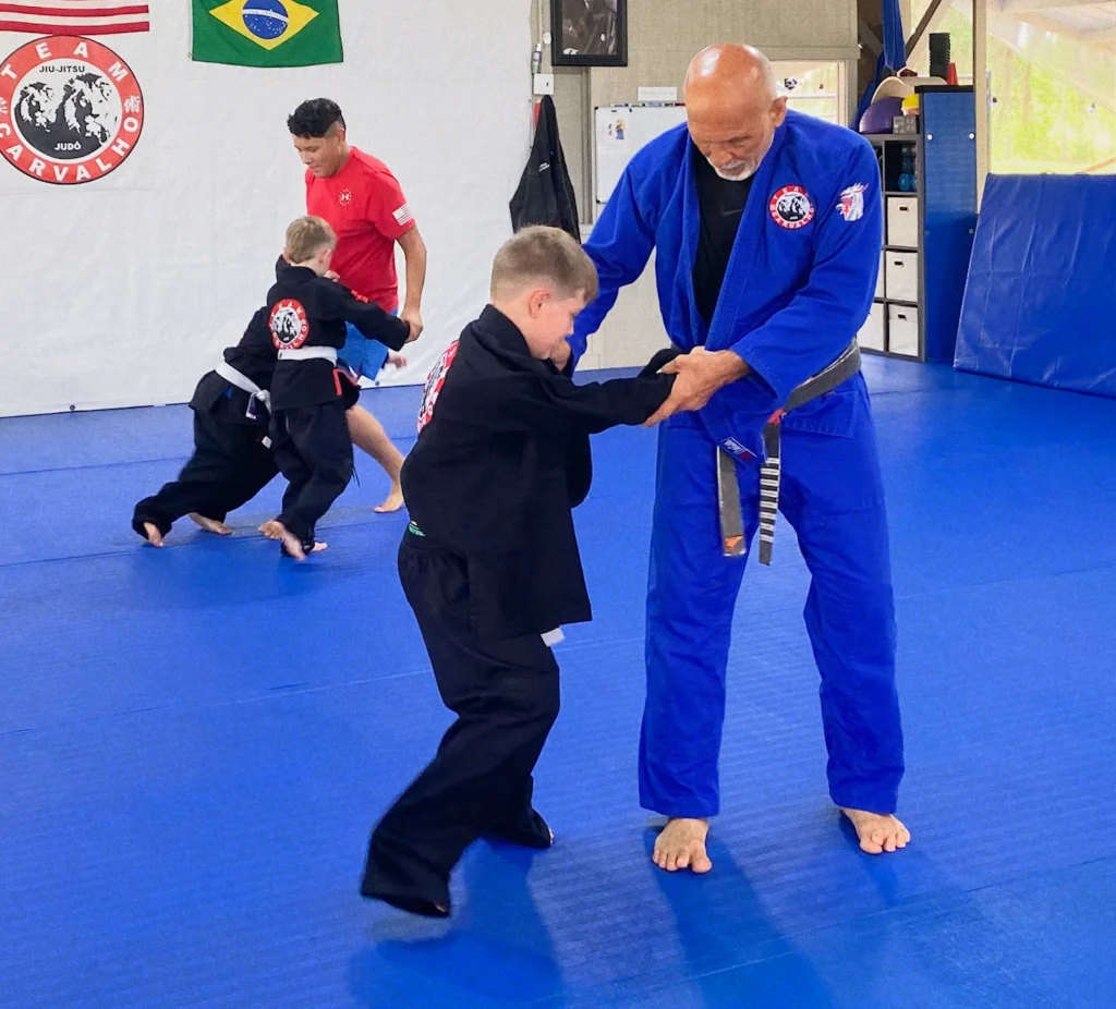 Team Carvalho Juniors program students practicing throws