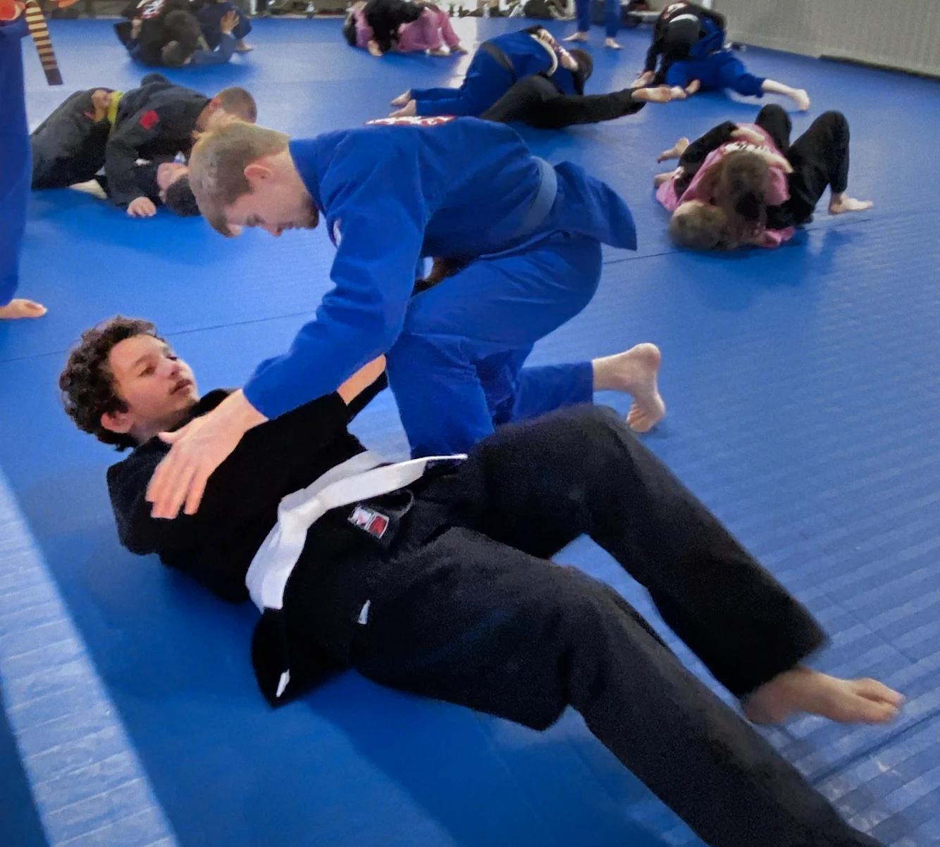 Teenagers in white belt during Teens class